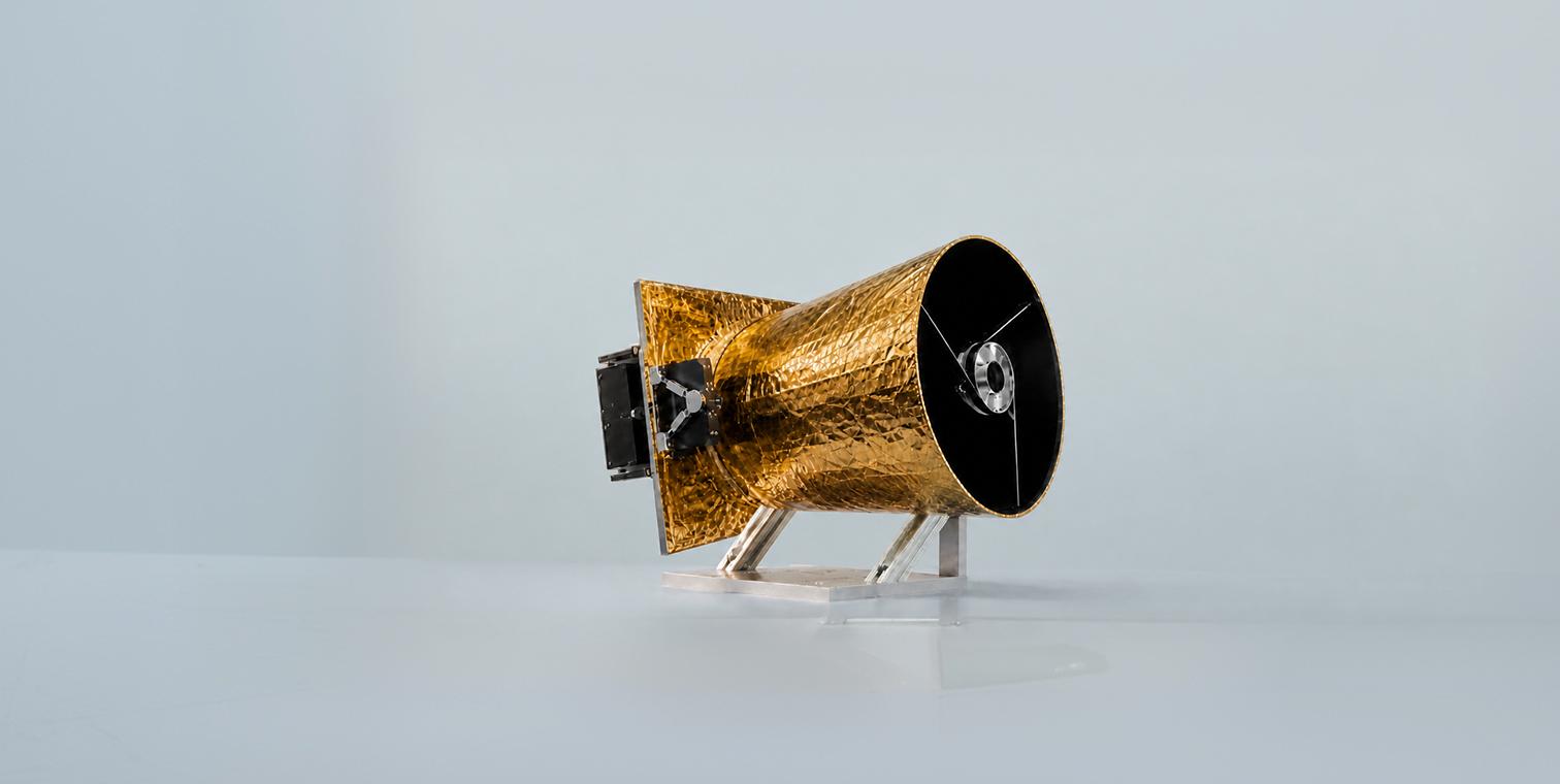 The gold-foiled Fineview optical payload on a test stand